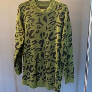 Green oversized animal print sweater. Size large.